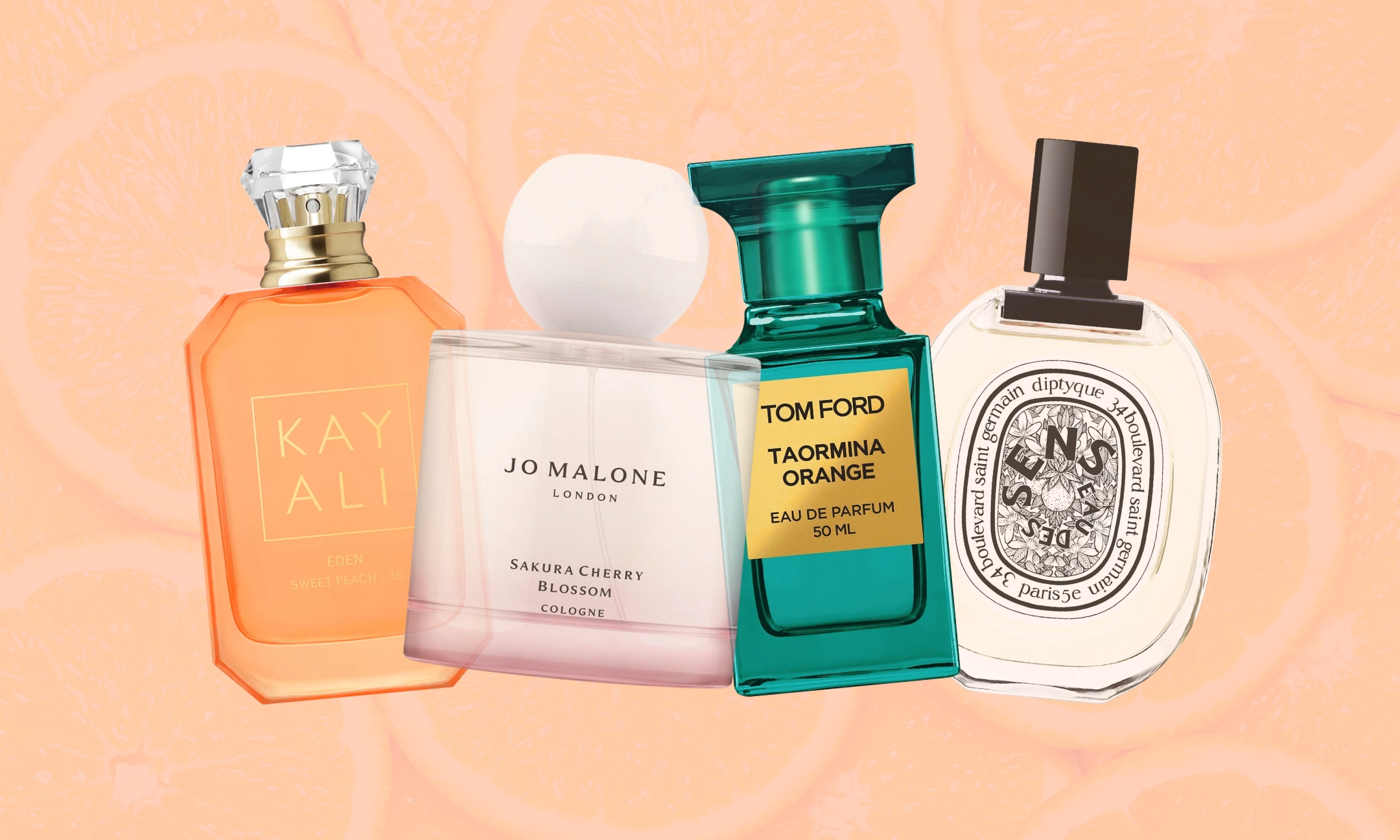 A lineup of four fragrances — Kayali Eden Sweet Peach 35, Jo Malone London Sakura Cherry Blossom Cologne, Tom Ford Taormina Orange Eau de Parfum, and Diptyque Eau des Sens — set against a blurred background of sliced oranges.