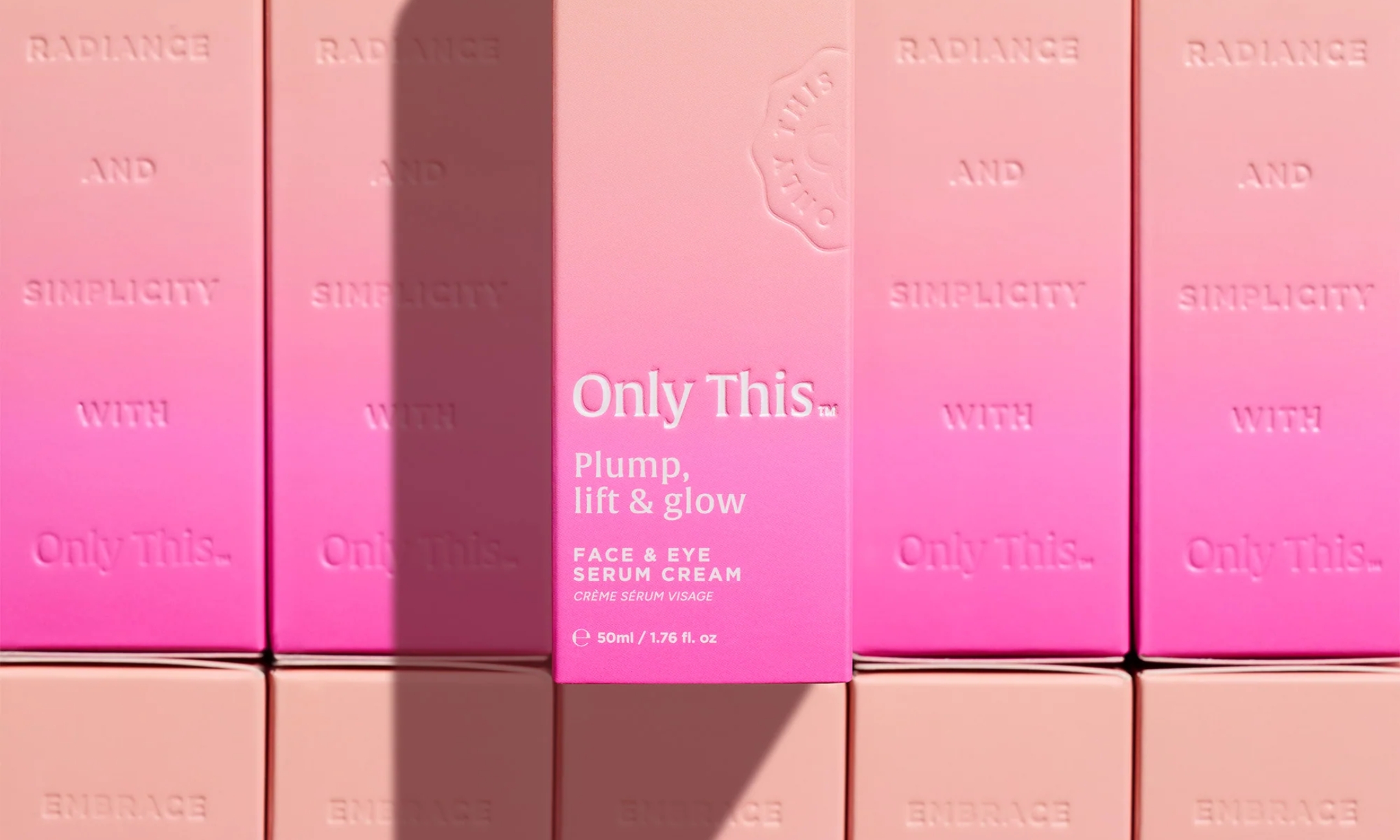 Pink and beige packaging boxes for Only This Plump, Lift & Glow Face & Eye Serum Cream arranged in a repeating grid pattern.