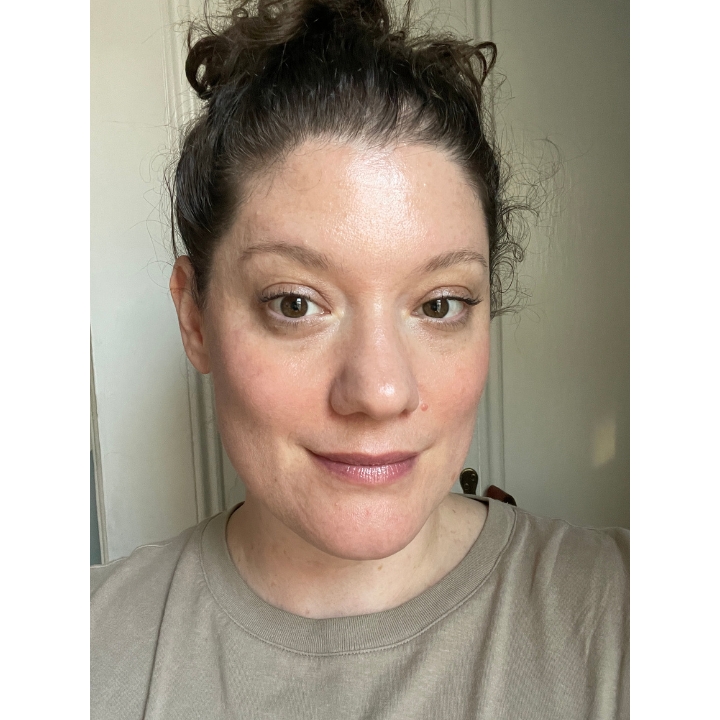 Selfie of a woman testing Tower 28 Swipe Serum Foundation after 8 hours of wear.