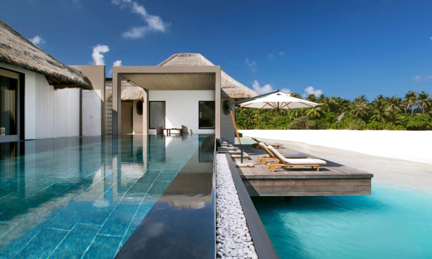 luxury water villa next to beach