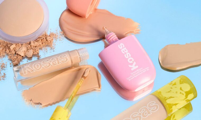 Kosas cosmetics products on a blue background